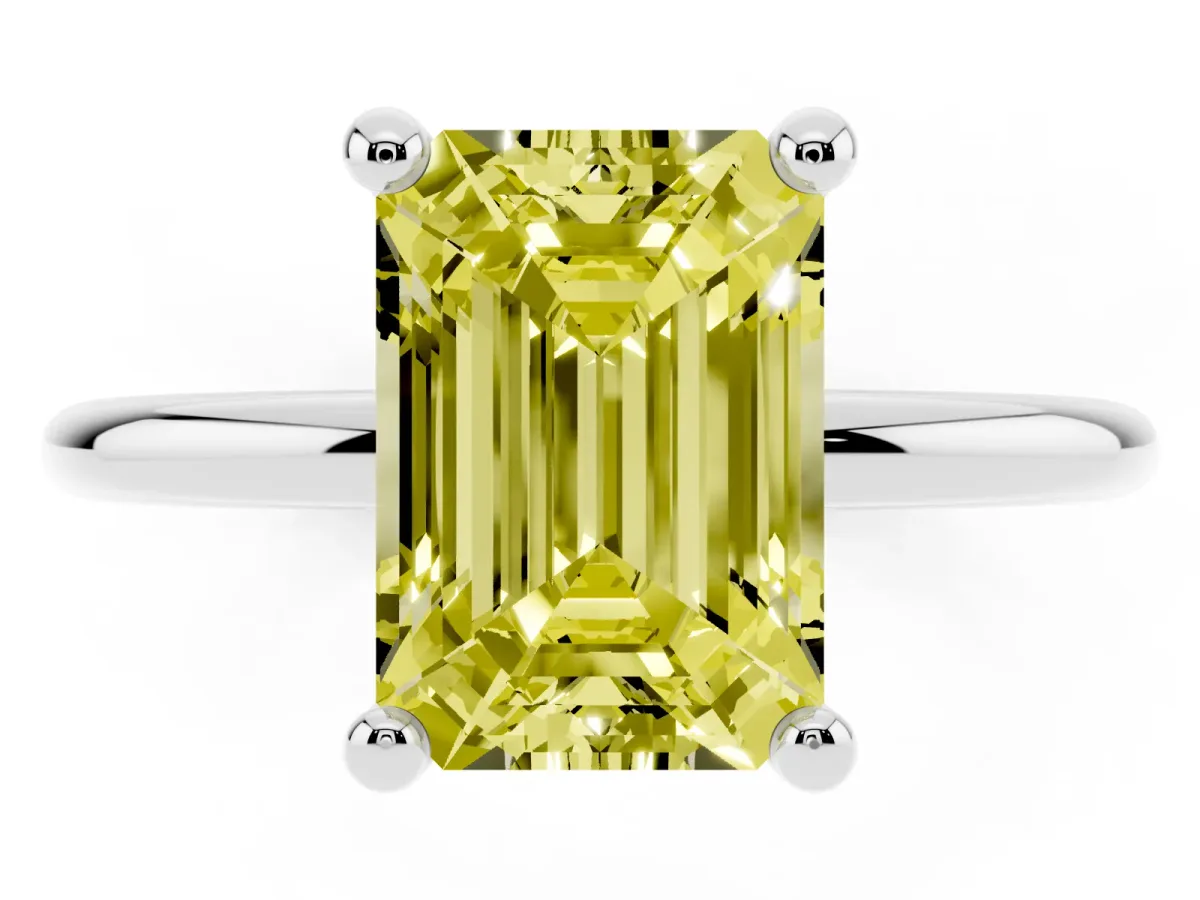 Fancy Yellow Emerald Cut Solitaire Diamond Ring with 4-Prong Setting on a Classic Band White gold