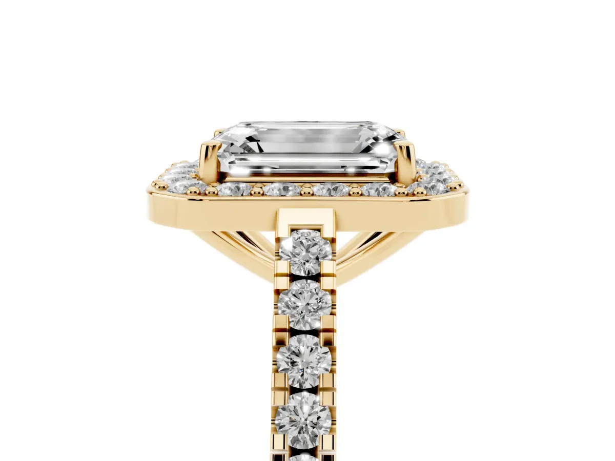 Emerald Cut Diamond Halo Ring with Round Pavé Split Shank and Prong Setting Yellow gold