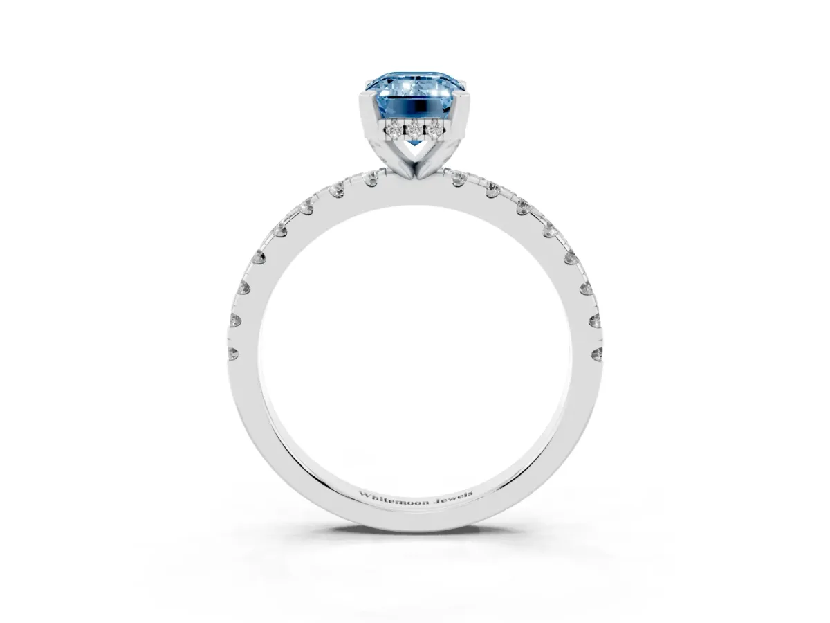 Fancy Blue Emerald Cut Diamond Solitaire Ring with Round Pavé Band and Four-Prong Setting Silver