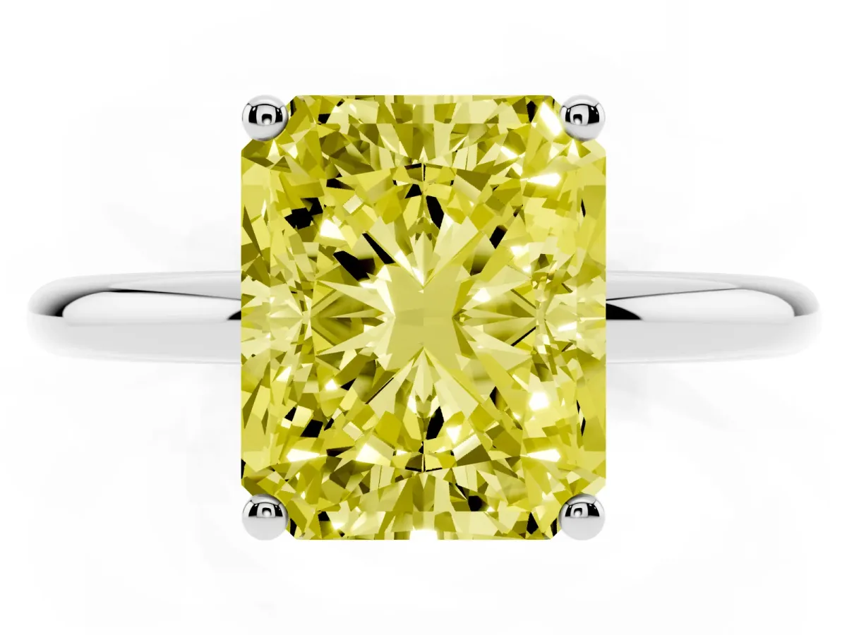 Fancy Yellow Radiant Cut Cut Solitaire Engagement Ring with Four-Prong Setting and Classic Band Silver