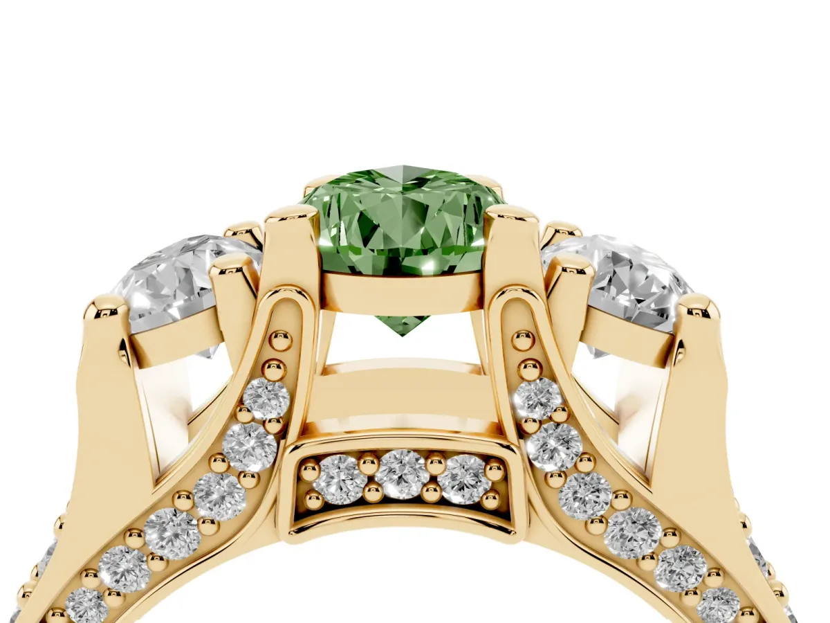 Fancy Green Pear Cut Diamond Three-Stone Ring with Channel Set Band and Four-Prong Setting Yellow gold