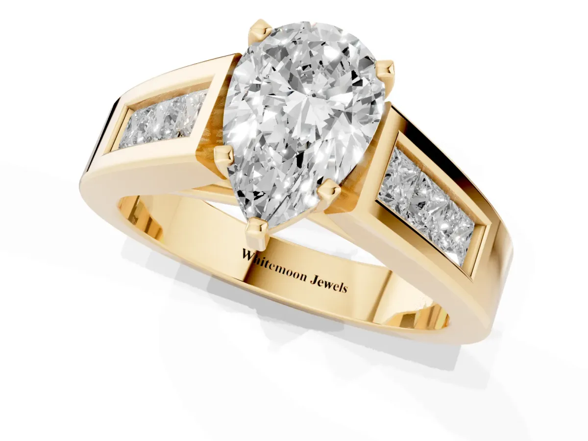 Pear Cut Cut Channel Set Solitaire Ring with Four-Prong Setting Yellow gold