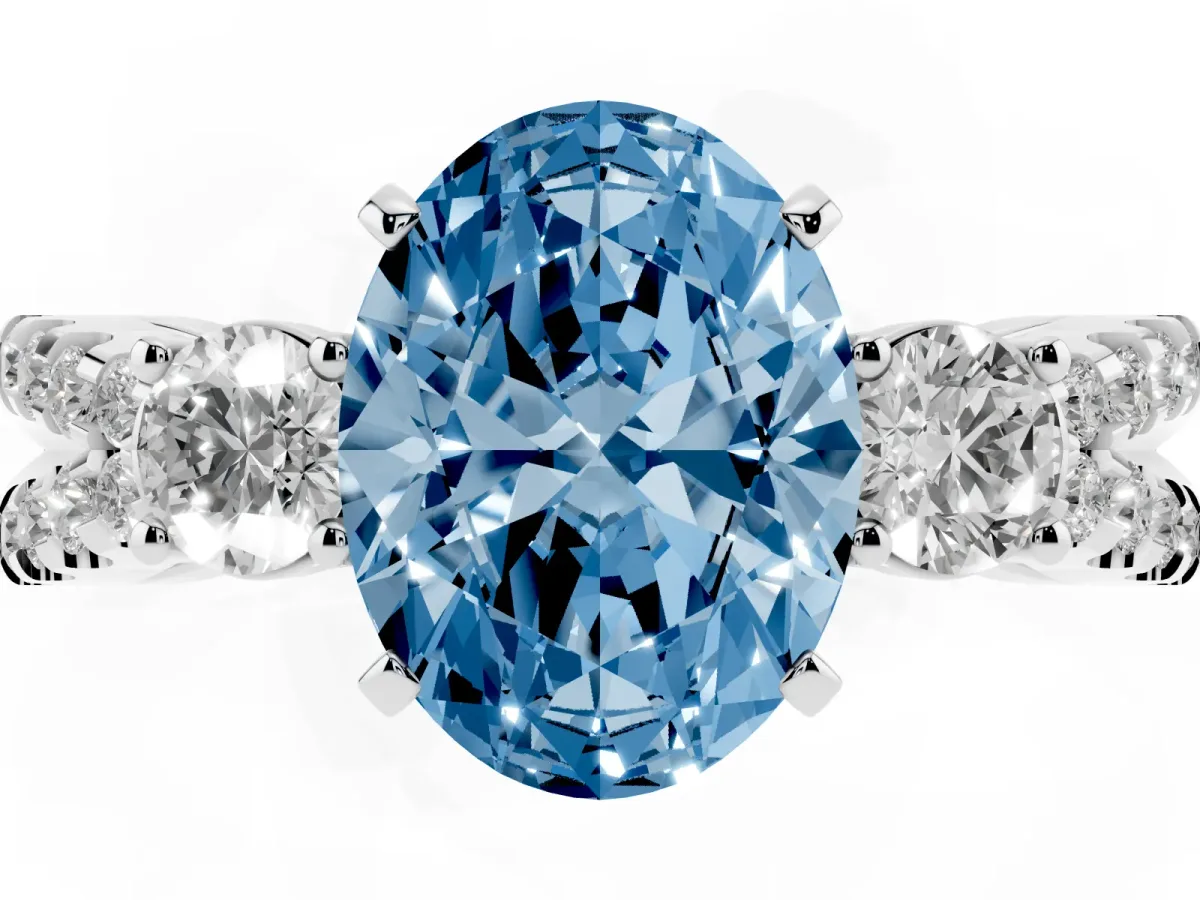 Fancy Blue Oval Cut Diamond Three-Stone Ring with Pavé Split Shank and Four-Prong Setting Silver