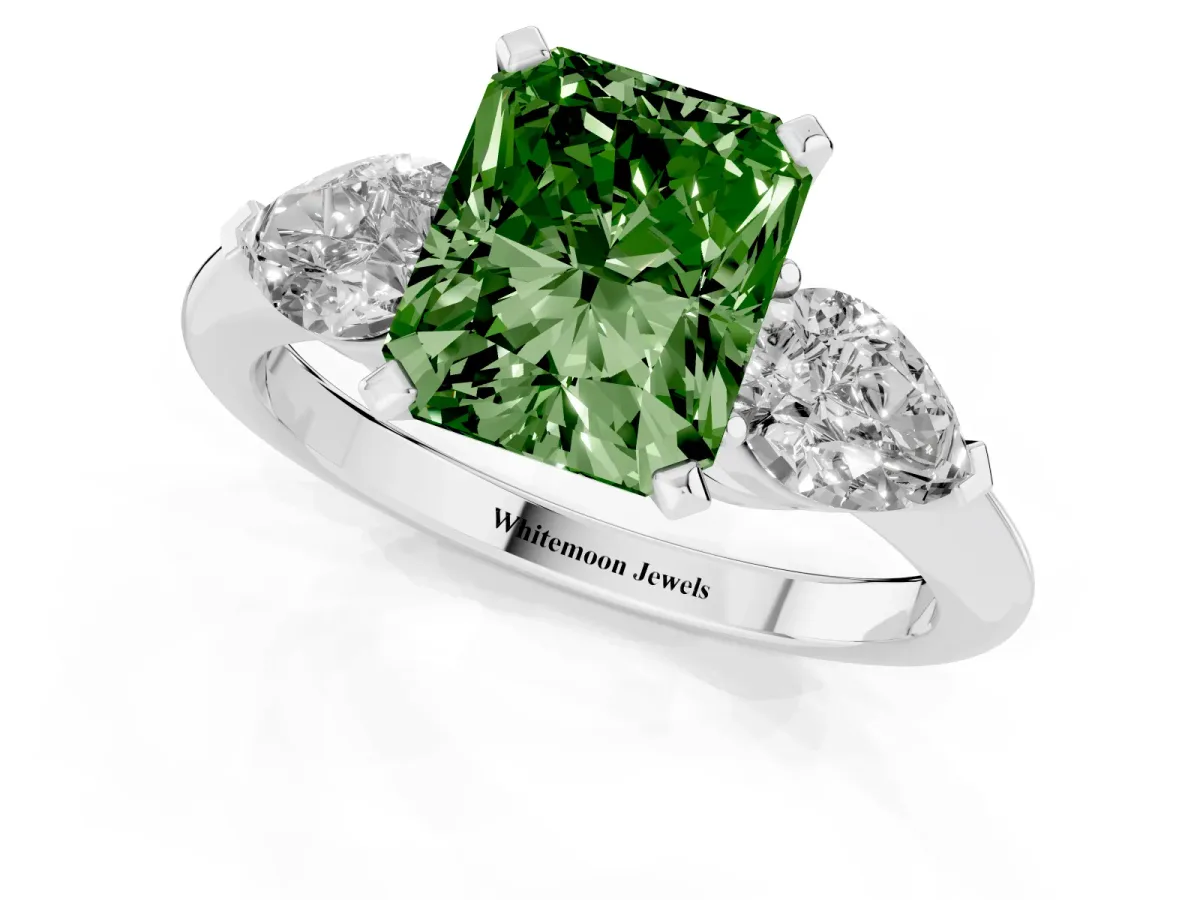 Fancy Green Three-Stone Radiant Cut Diamond Ring with Pear Side Stones and Four-Prong Setting Silver