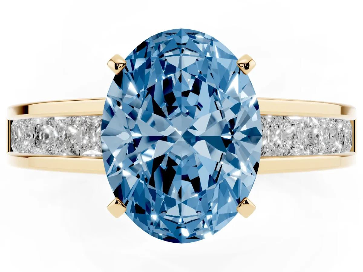 Fancy Blue Oval Cut Solitaire Diamond Ring with Channel-Set Band and Four-Prong Setting Yellow gold