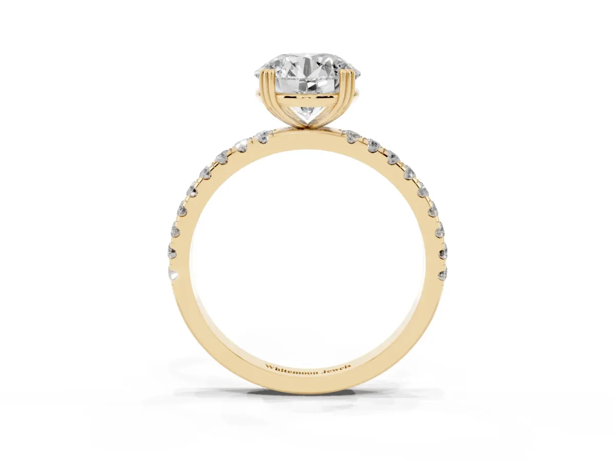 Round Cut Brilliant Solitaire with Pavé Band and Claw Prong Setting Yellow gold