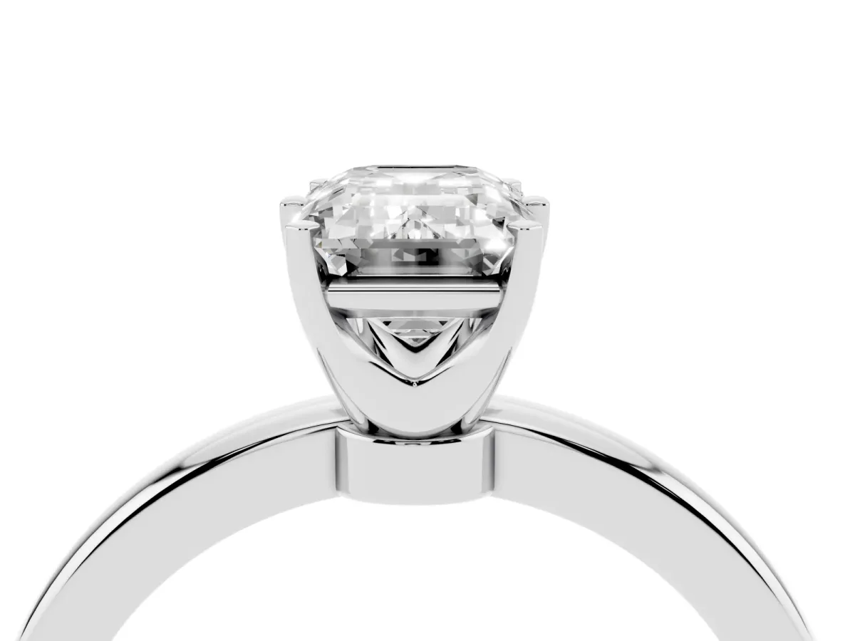 Emerald Cut Solitaire Diamond Ring with Six-Prong Setting on a Classic Band Silver