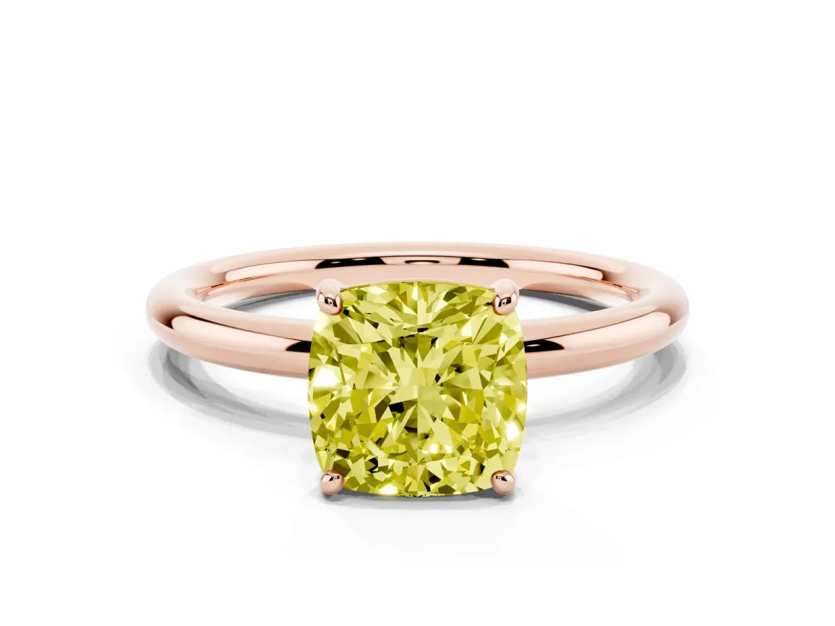 Fancy Yellow Cushion Cut Solitaire Diamond Ring with Four-Prong Setting on a Plain Band Rose gold