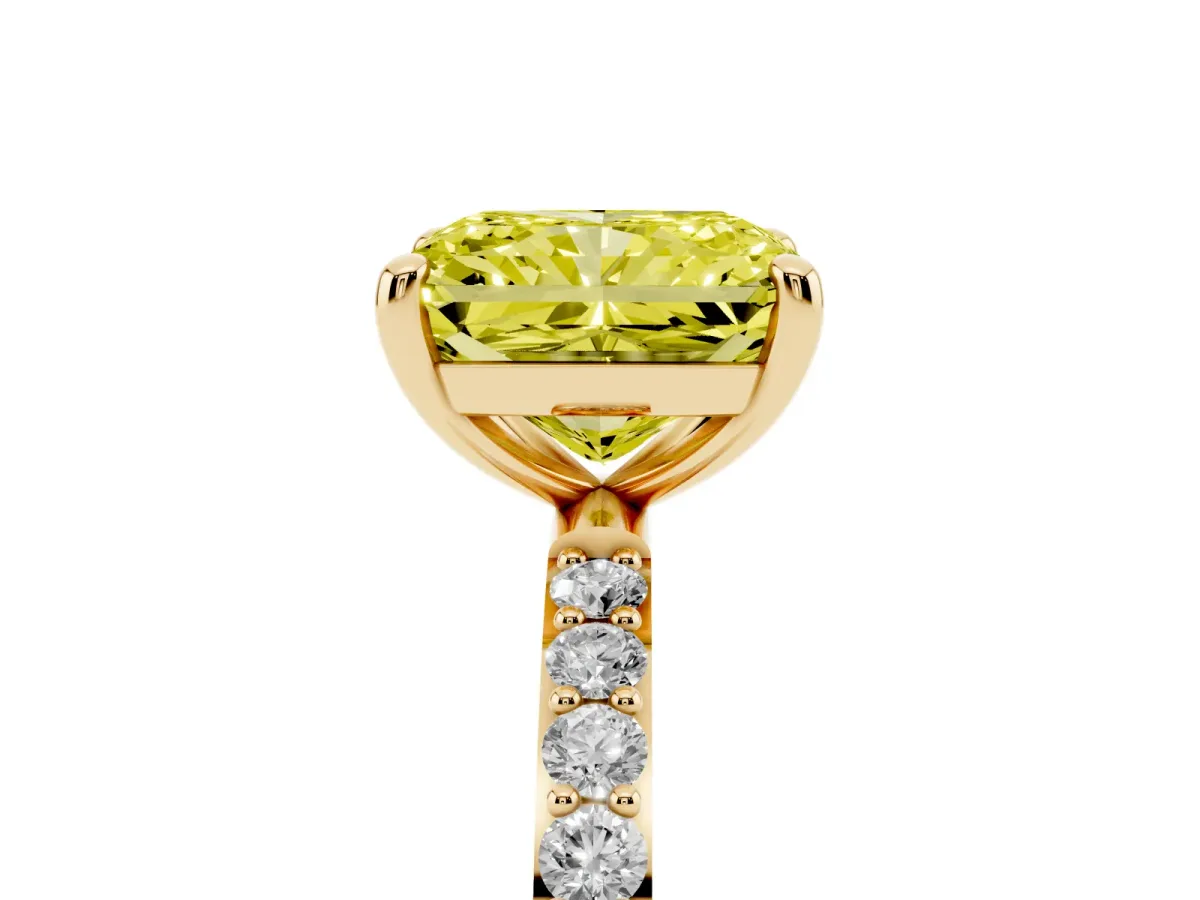 Fancy Yellow Radiant Cut Diamond Solitaire Ring with Round Pavé Band and Prong Setting Yellow gold