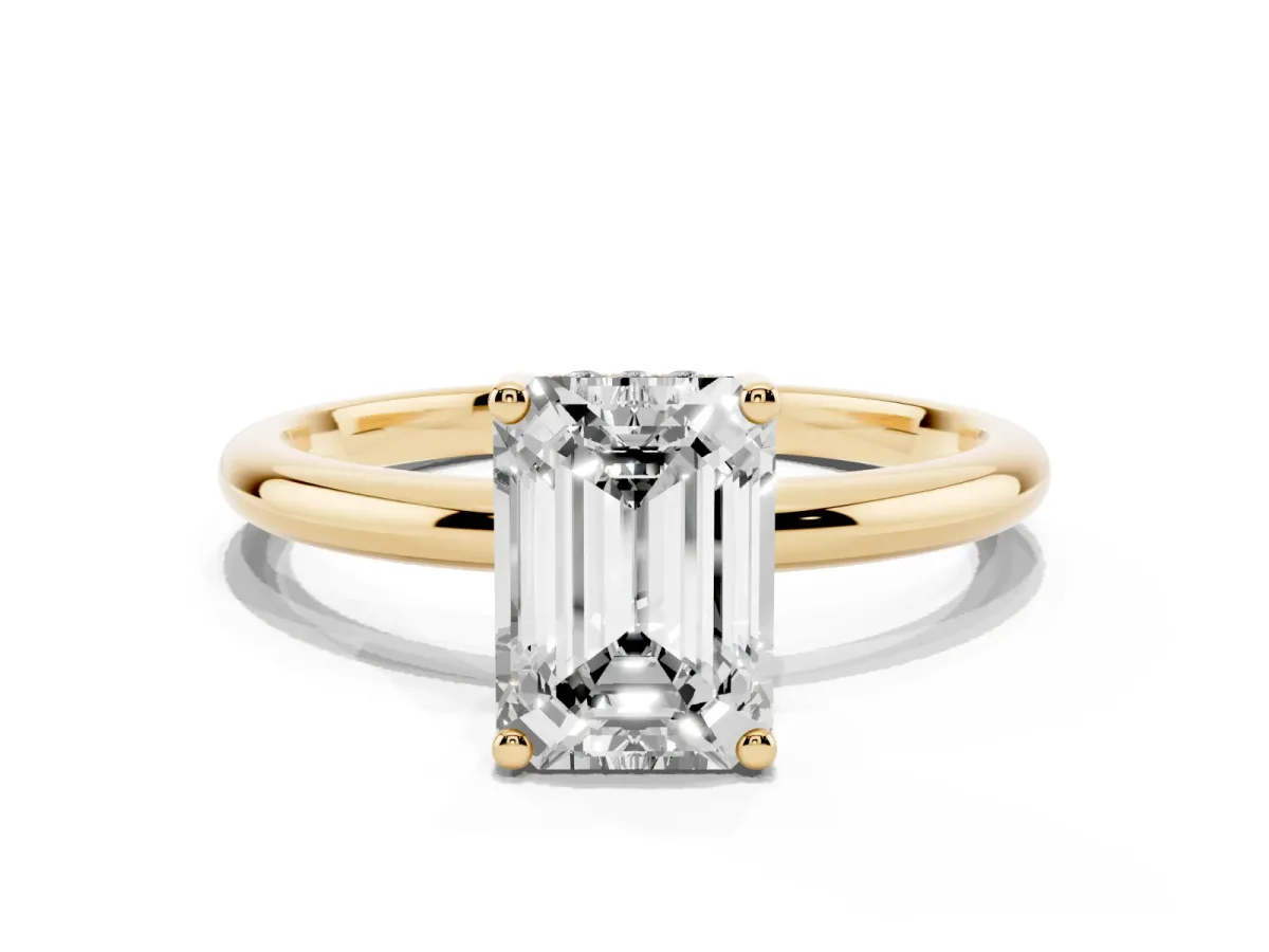 Emerald Cut Cut Solitaire Engagement Ring with Four-Prong Setting and Classic Band Yellow gold
