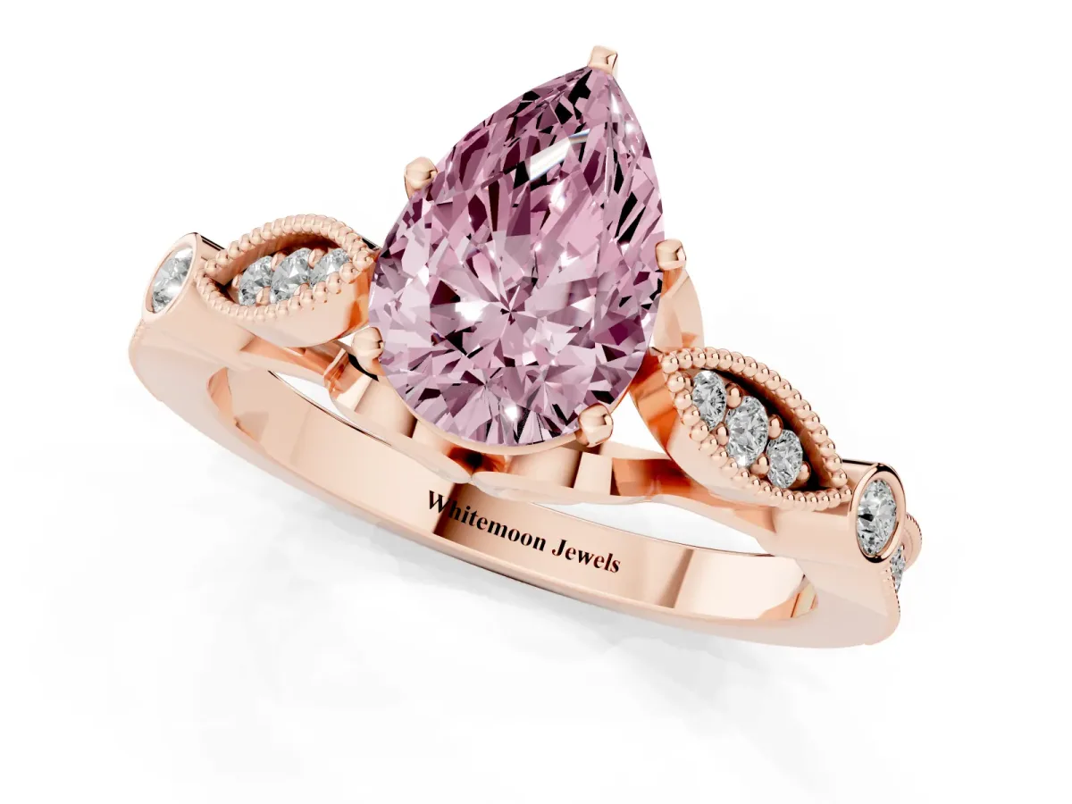 Fancy Pink Pear Cut Cut Diamond with Milgrain Marquise and Bezel Accents on a Solitaire Band with Prong Setting Rose gold