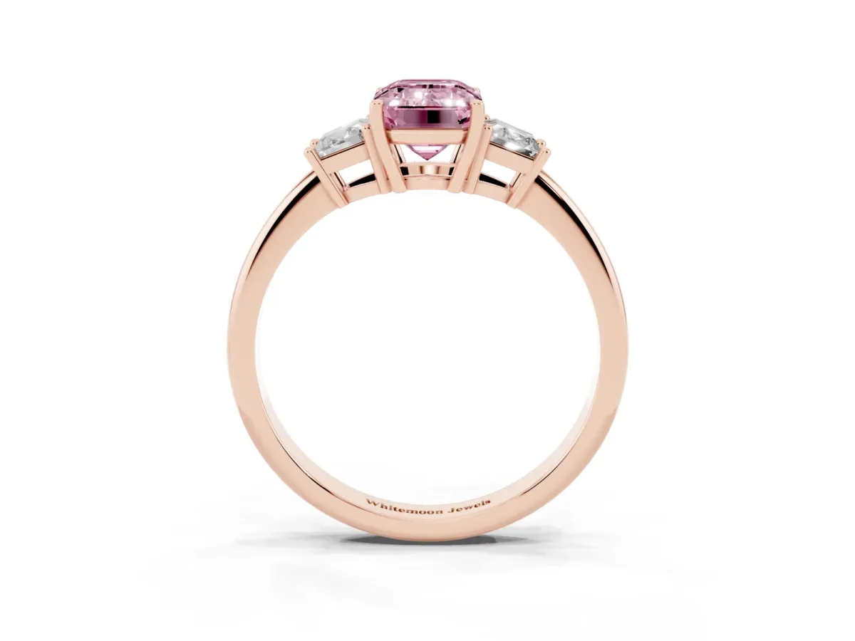 Fancy Pink Emerald Cut Diamond Three-Stone Ring with Trapezoid Side Stones and Prong Setting Rose gold