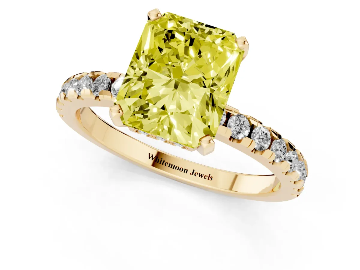 Fancy Yellow Radiant Cut Diamond Solitaire Ring with Round Pavé Band and Four-Prong Setting Yellow gold