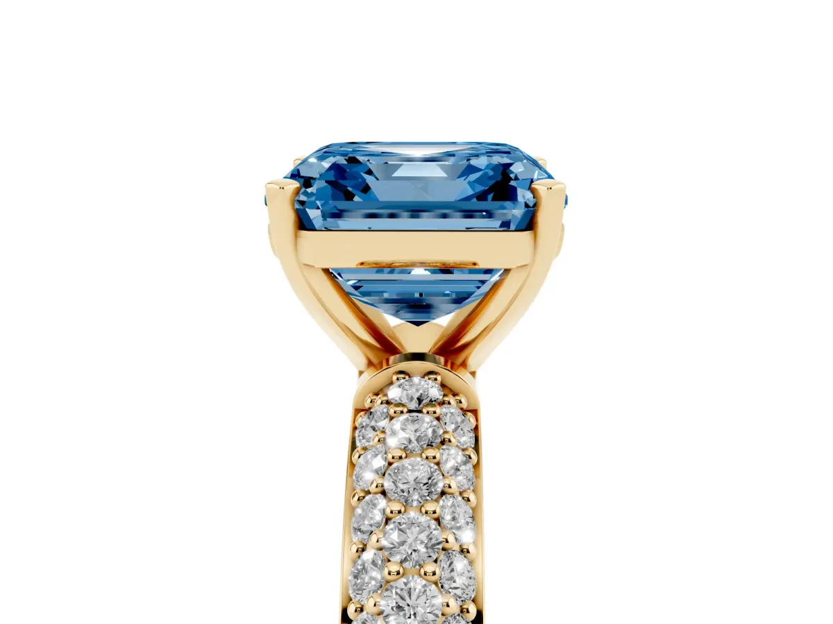 Fancy Blue Asscher Cut Diamond Solitaire Ring with Prong Setting and Pavé Band Yellow gold