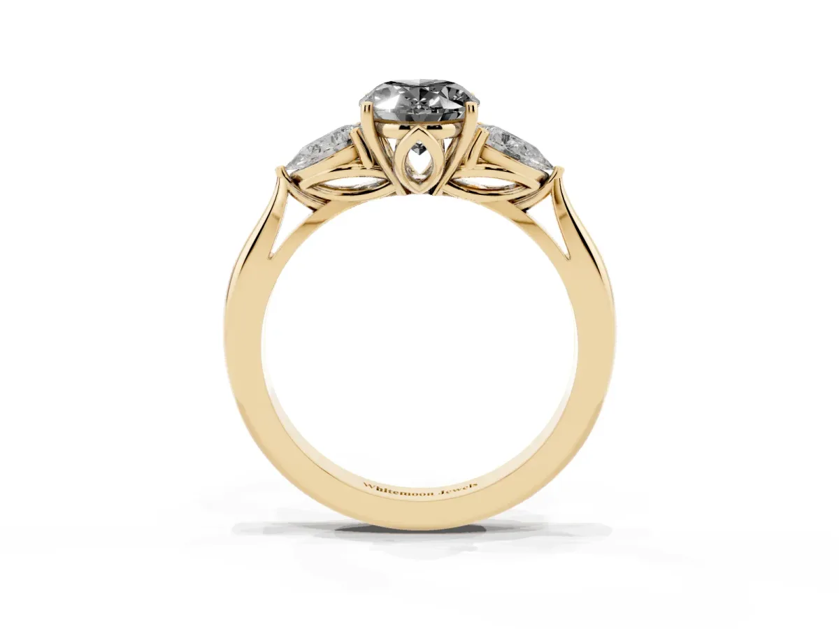Fancy Black Three-Stone Oval Cut Brilliant Diamond Solitaire Ring with Tapered Band and Four-Prong Setting Yellow gold