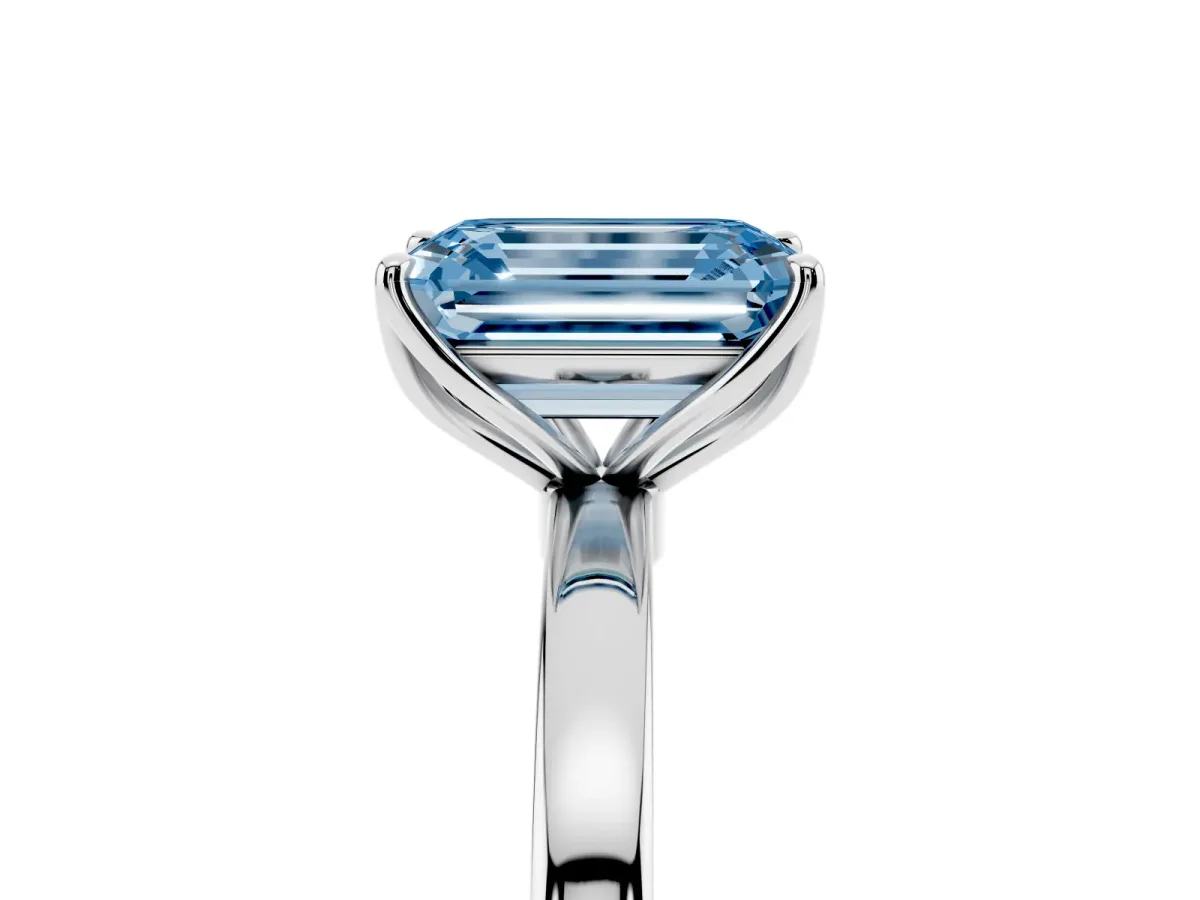 Fancy Blue Emerald Cut Diamond Solitaire Ring with Thin Band and Prong Setting Silver