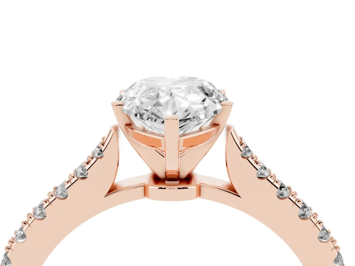 Pear Cut Cut Solitaire Diamond Engagement Ring with Pave Band and Four-Prong Setting Rose gold