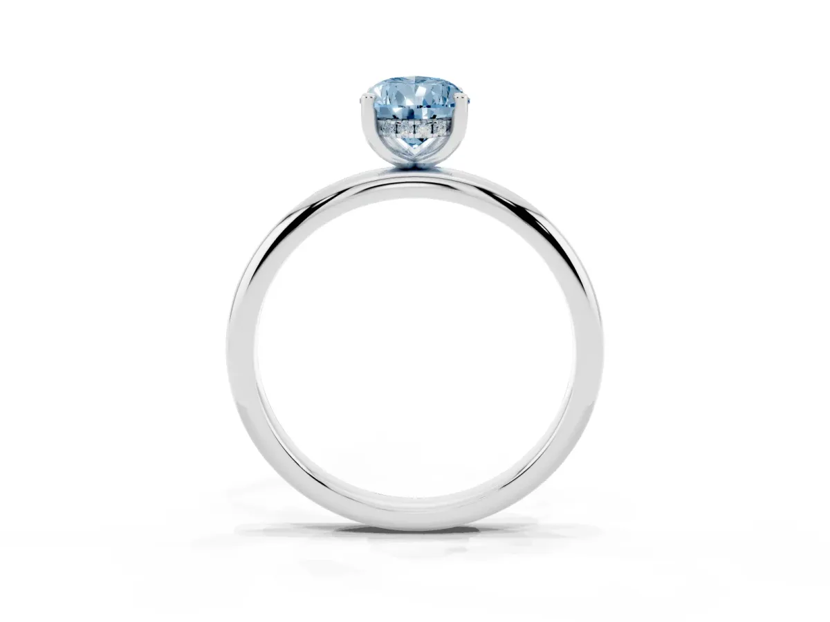 Fancy Blue Pear Cut Cut Solitaire Engagement Ring with Four-Prong Setting and Classic Band Silver