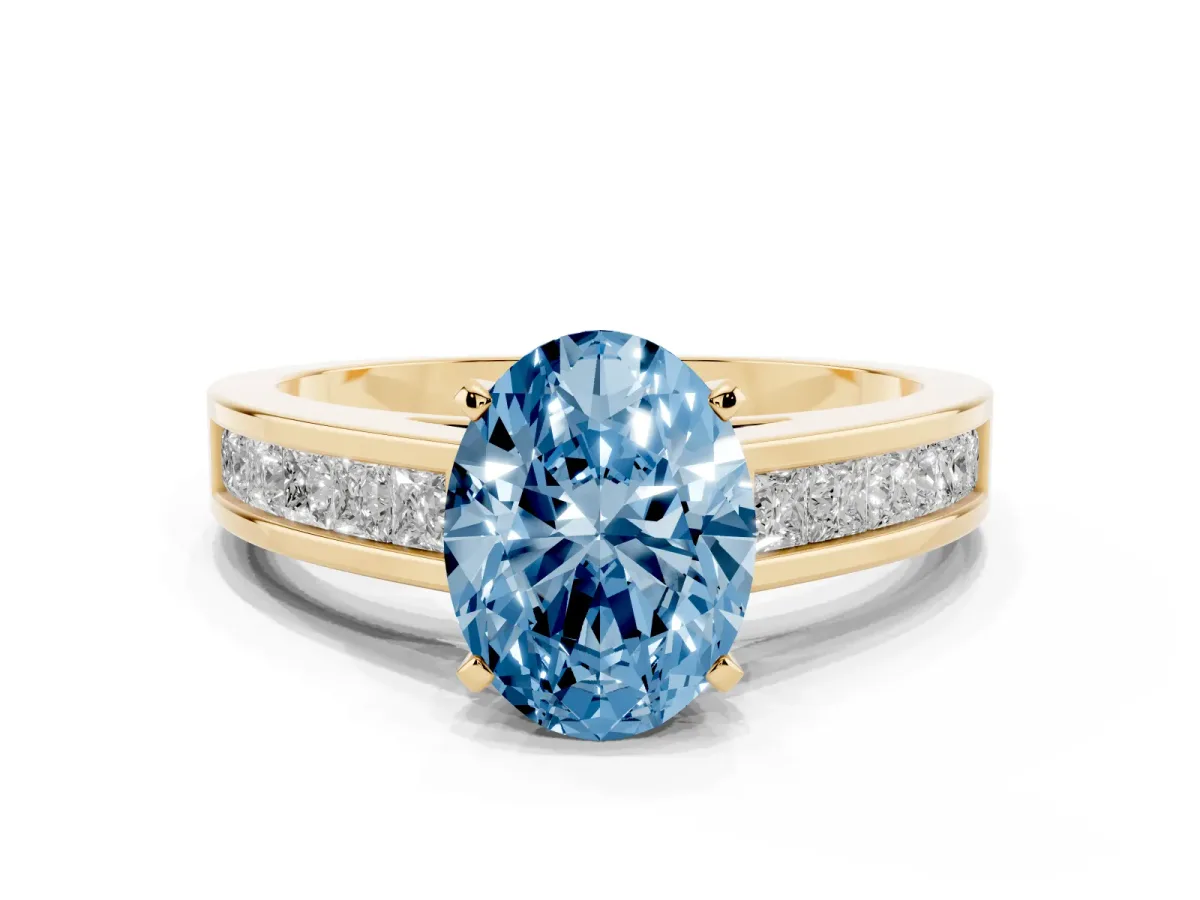 Fancy Blue Oval Cut Solitaire Diamond Ring with Channel-Set Band and Four-Prong Setting Yellow gold