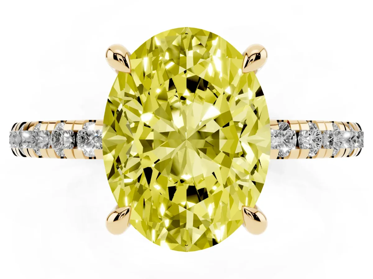 Fancy Yellow Oval Cut Diamond Brilliant Solitaire Ring with Pavé Band and Four-Prong Setting Yellow gold