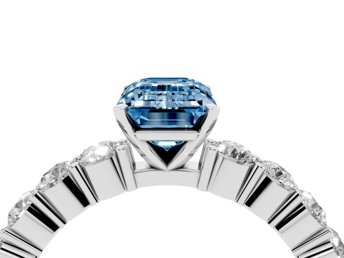 Fancy Blue Emerald Cut Diamond Solitaire Ring with Shared Prong Round Side Stones Platinum