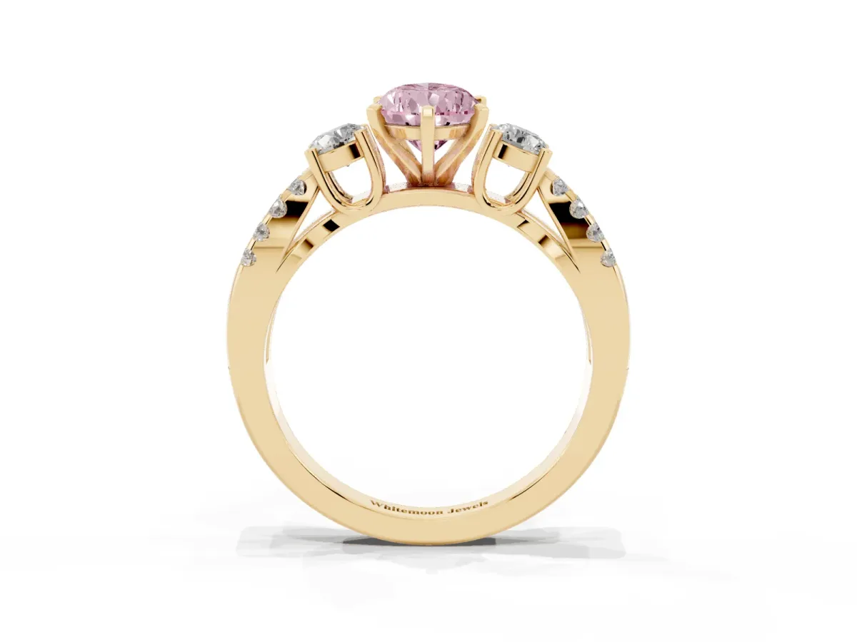 Fancy Pink Pear Cut Diamond Three-Stone Ring with Pavé Split Shank and Four-Prong Setting Yellow gold