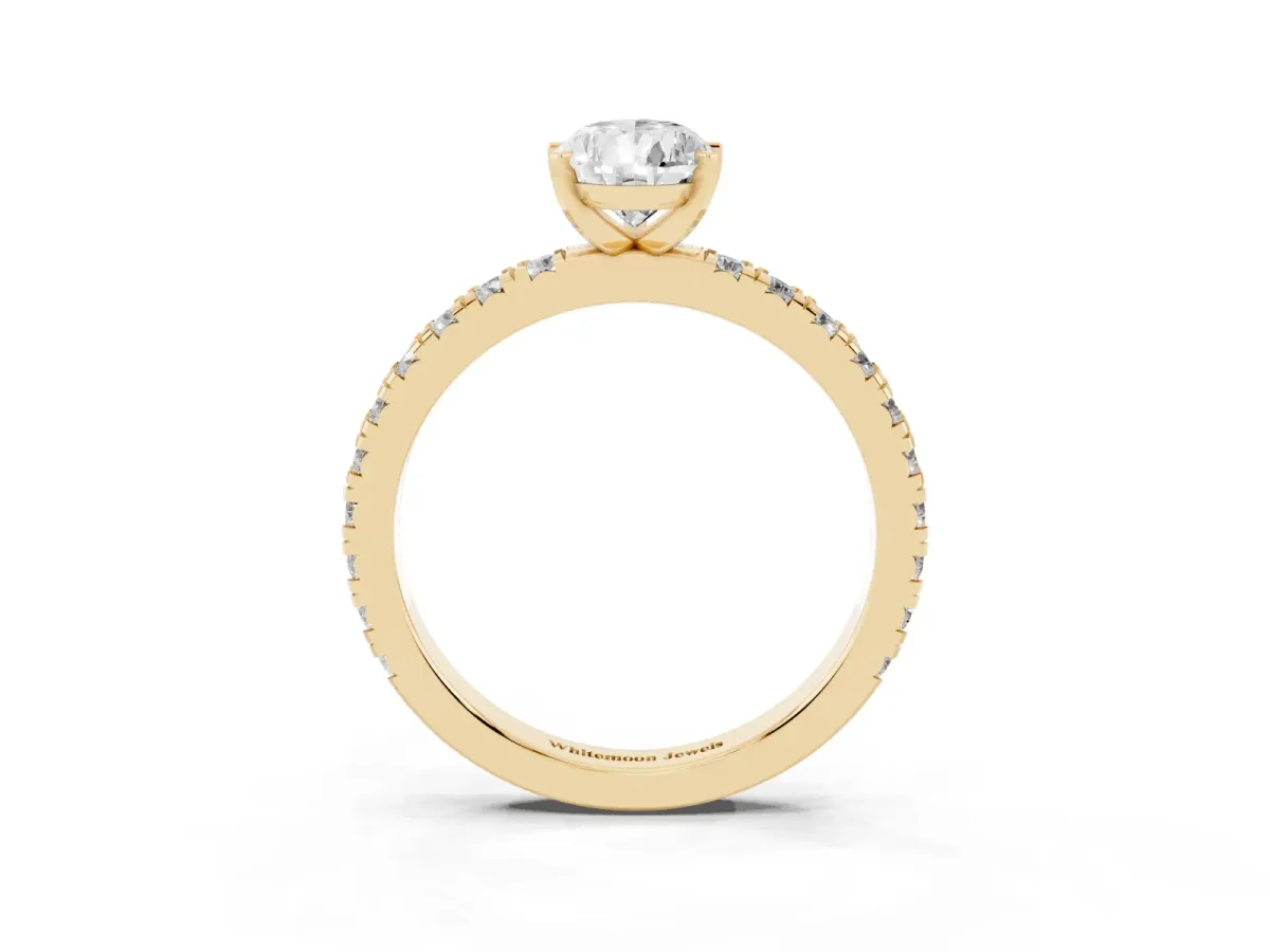 Pear Cut Diamond Pavé Band Solitaire with Four-Prong Setting Yellow gold