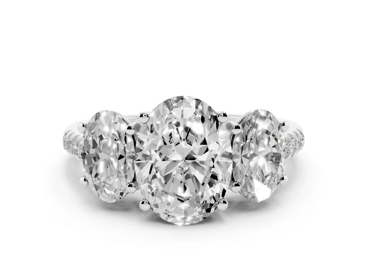 Three-Stone Oval Cut Diamond Ring with Round Pavé Band and Prong Setting Platinum
