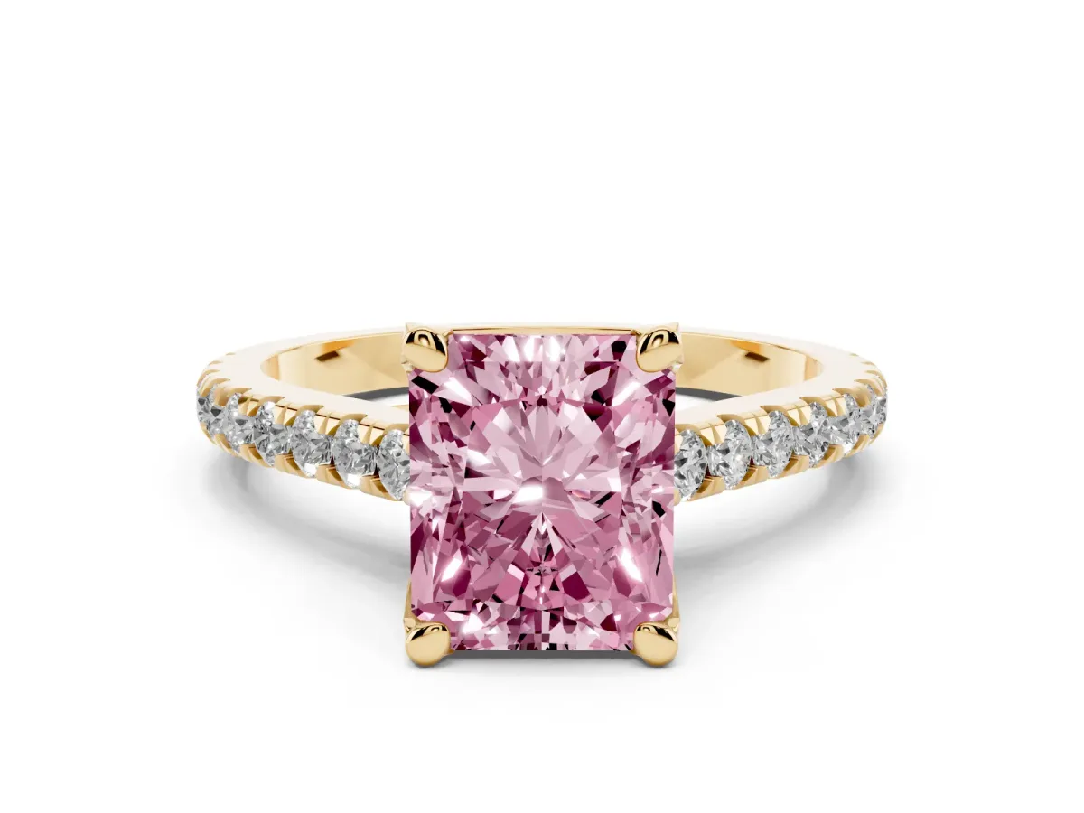 Fancy Pink Radiant Cut Brilliant Diamond Solitaire with Pavé Band and Four-Prong Setting Yellow gold