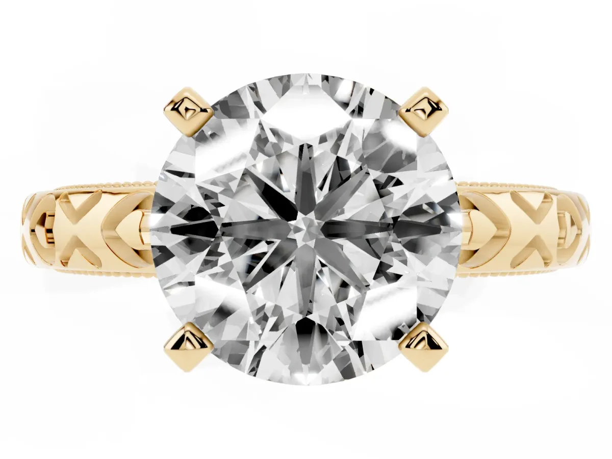 Round Cut Solitaire Diamond Engagement Ring with XO Engraved Band and Four-Prong Setting Yellow gold