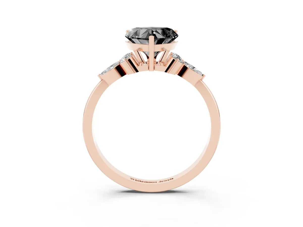 Fancy Black Heart Cut Brilliant Diamond Solitaire Ring with Pear Side Stones and Four-Prong Setting Rose gold