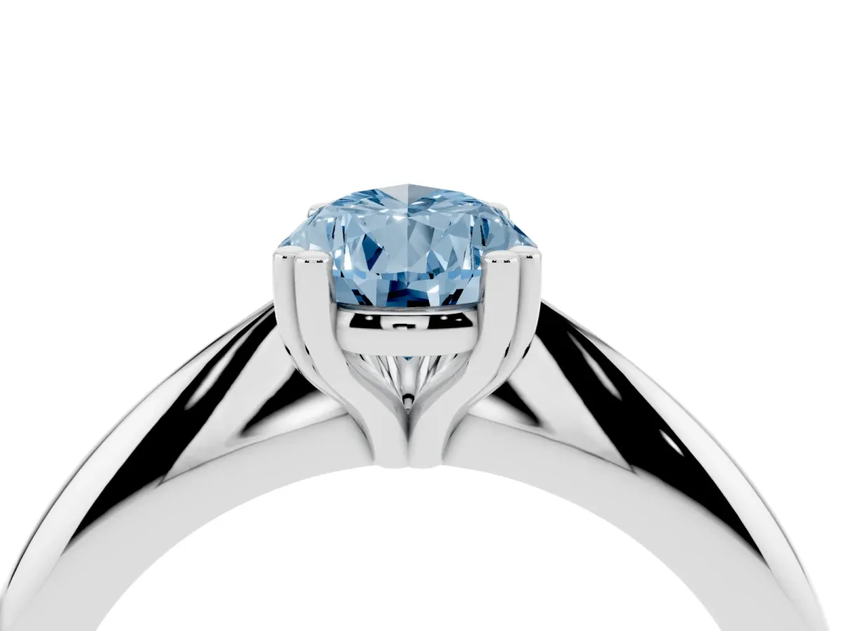 Fancy Blue Pear Cut Cut Solitaire Engagement Ring with Tapered Band and Four-Prong Setting White gold