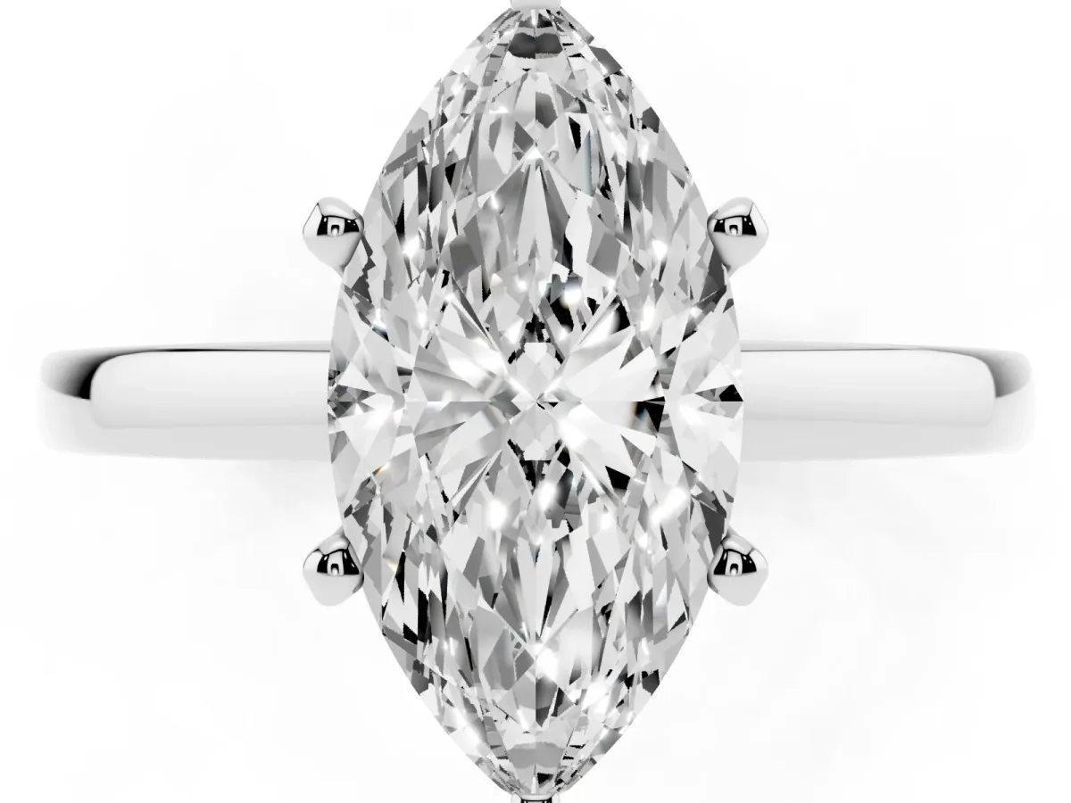 Marquise Cut Solitaire Diamond Engagement Ring with Four-Prong Setting on a Classic Band Silver