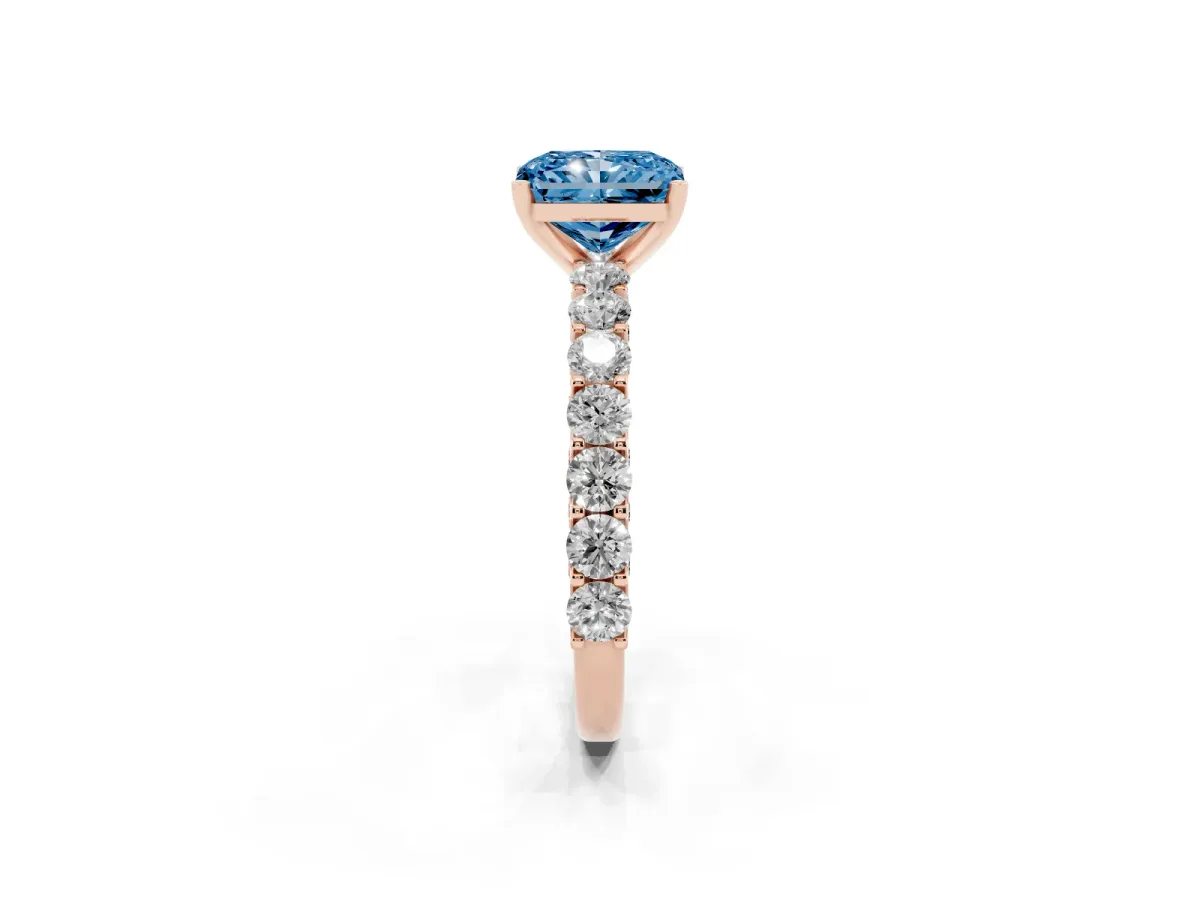 Fancy Blue Radiant Cut Diamond Solitaire Ring with Shared Prong Pavé Band and Four-Prong Setting Rose gold