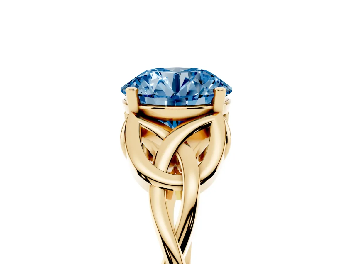 Fancy Blue Round Cut Diamond Solitaire Engagement Ring with Celtic Knot Band and Four-Prong Setting Yellow gold
