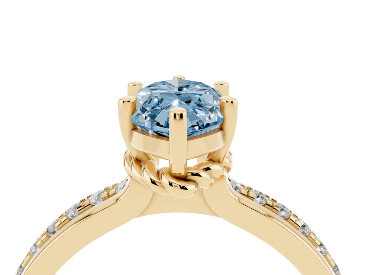 Fancy Blue Marquise Cut Solitaire Diamond Ring with Channel Set Band and Six-Prong Setting Yellow gold