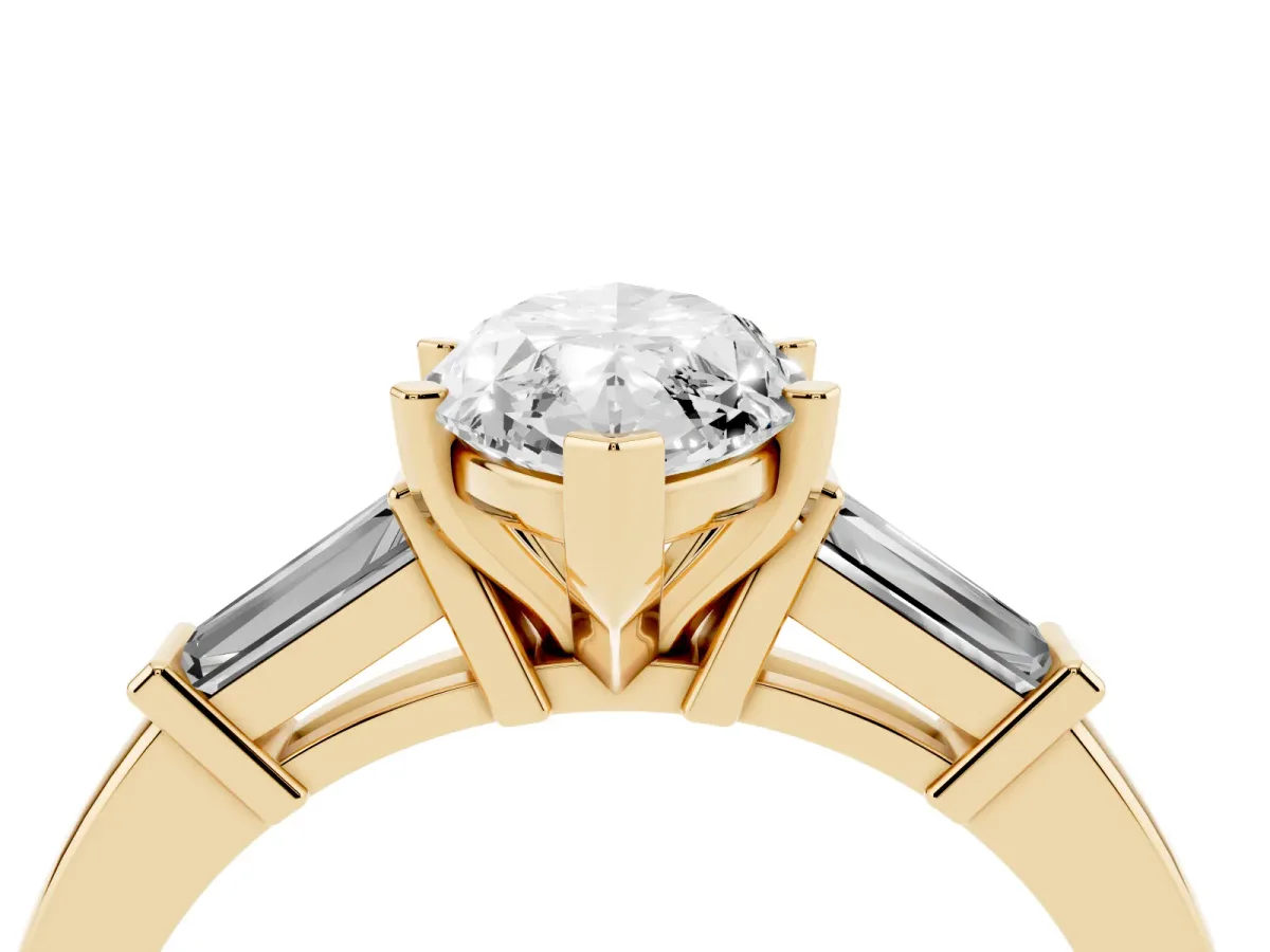 Marquise Cut Cut Diamond Solitaire Ring with Tapered Baguette Accents and Four-Prong Setting Yellow gold