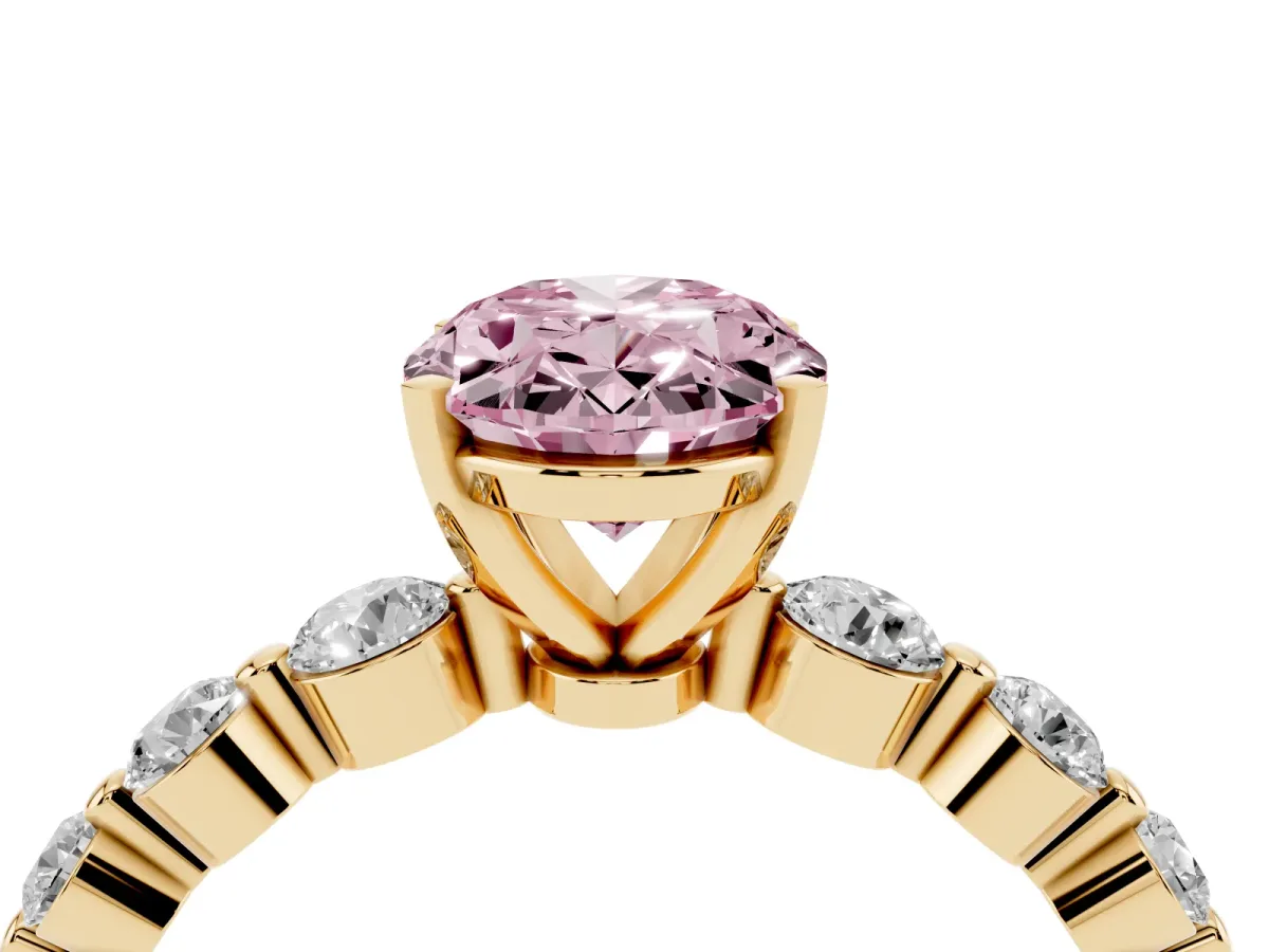 Fancy Pink Oval Cut Solitaire Diamond Ring with Pave Band and Four-Prong Setting Yellow gold