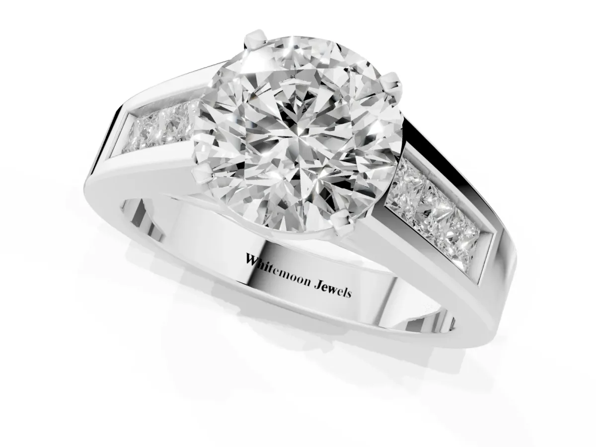 Round Cut Cut Channel Set Solitaire Ring with Four-Prong Setting Silver