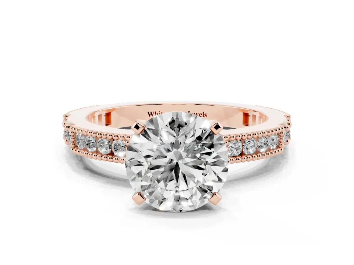 Round Cut Solitaire with Pavé Band and Four-Prong Setting Rose gold