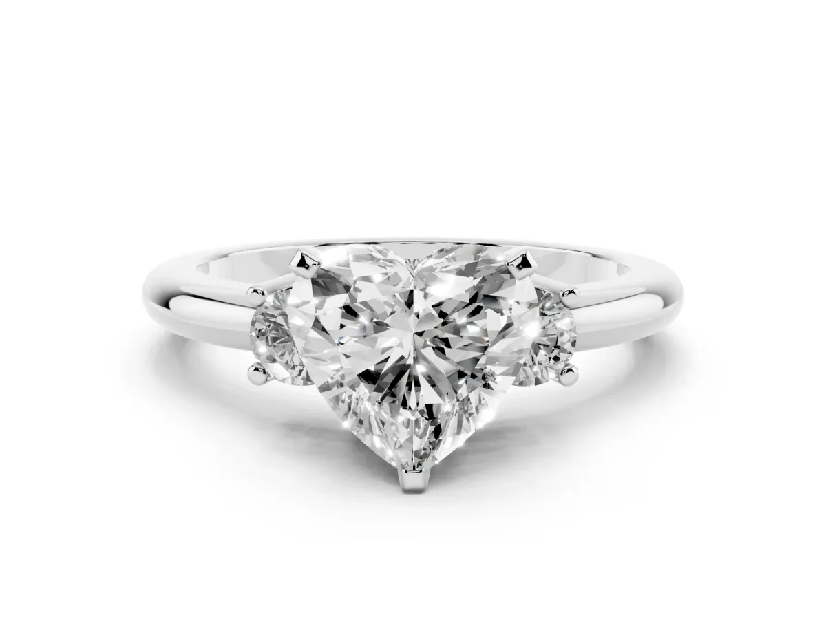 Three-Stone Heart Cut Cut Diamond Solitaire with Prong Setting and Classic Band Silver