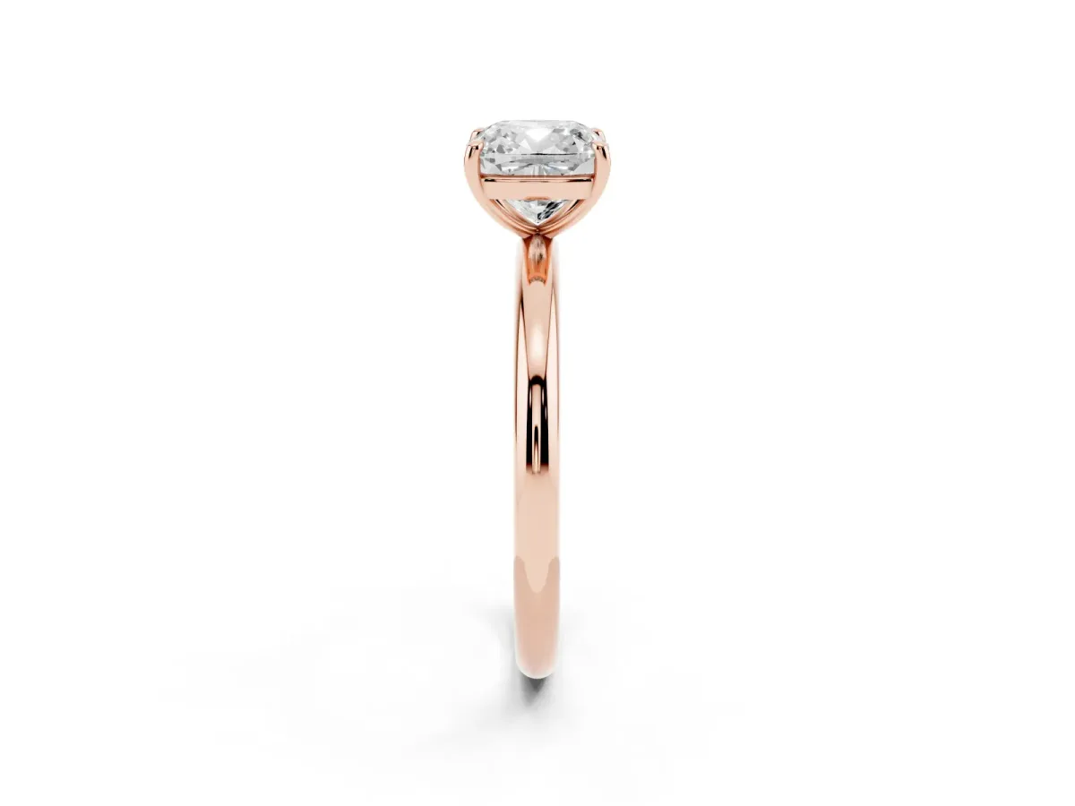 Cushion Cut Solitaire Diamond Ring with Four-Prong Setting on a Plain Band Rose gold