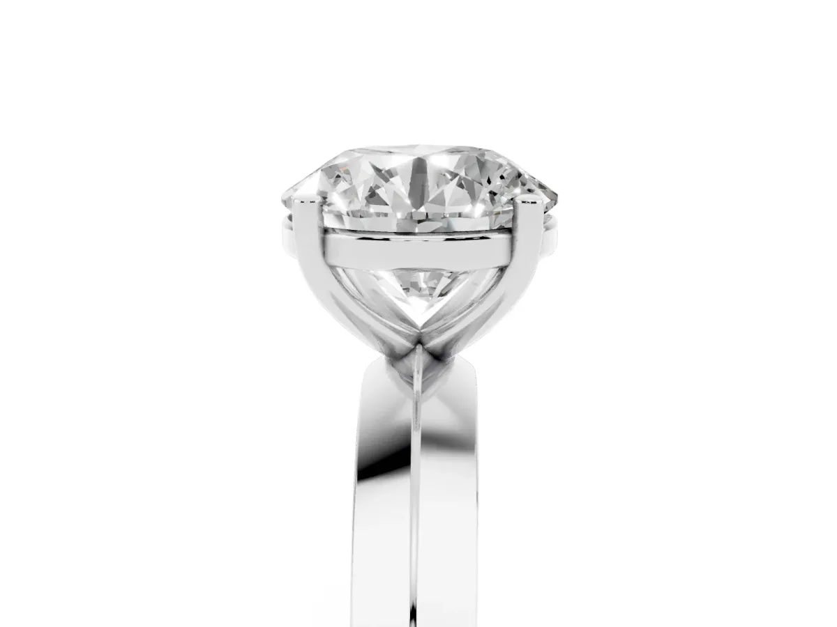Round Cut Cut Solitaire Engagement Ring with Flat Band and Four-Prong Setting Silver