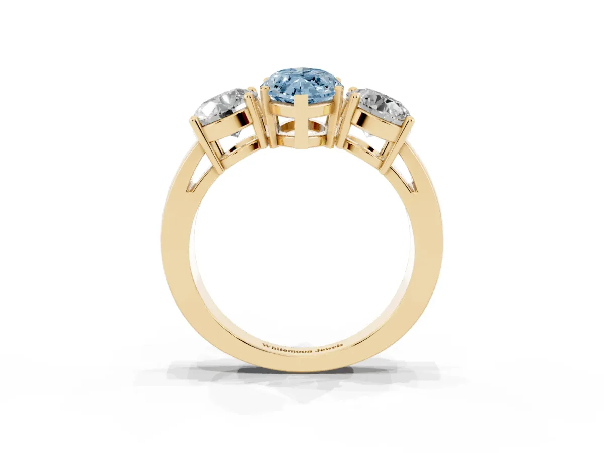 Fancy Blue Three-Stone Marquise Cut Diamond Ring with Round Side Stones, Classic Band, and Four-Prong Setting Yellow gold