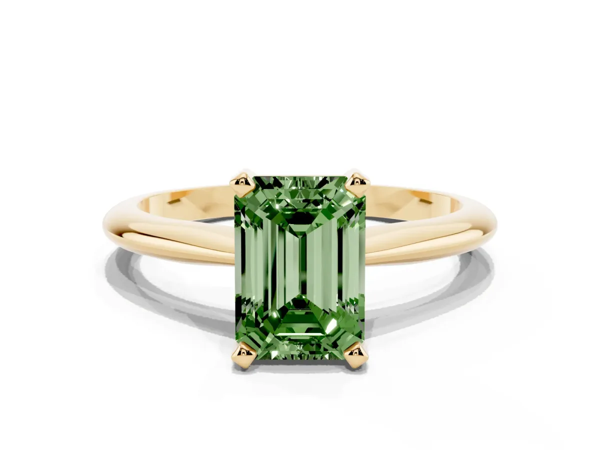 Fancy Green Emerald Cut Cut Solitaire Ring with Four-Prong Setting on a Classic Band Yellow gold