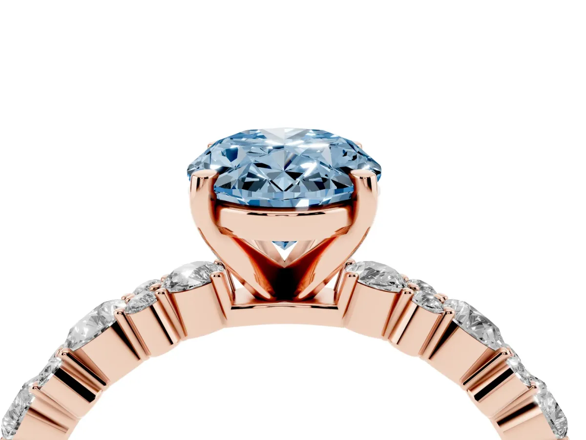 Fancy Blue Oval Cut Diamond Side Stone Solitaire Ring with Round and Four-Prong Setting Rose gold