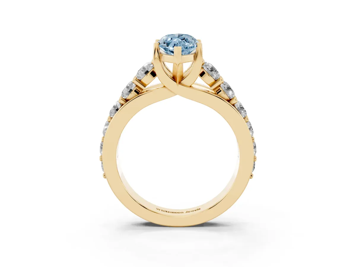 Fancy Blue Marquise Cut Diamond Engagement Ring with Pavé Band and Four-Prong Setting Yellow gold