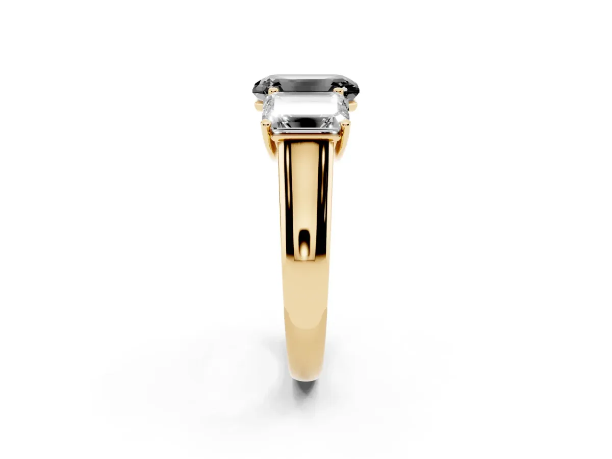 Fancy Black Emerald Cut Three-Stone Diamond Ring with Prong Setting on a Classic Band Yellow gold
