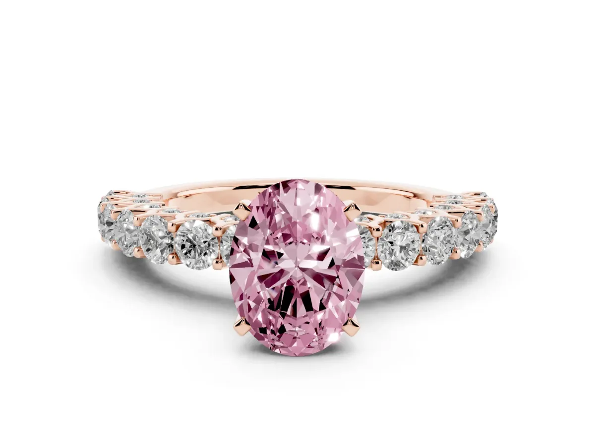 Fancy Pink Oval Cut Diamond Solitaire Ring with Shared Prong Pavé Band and Four-Prong Setting Rose gold