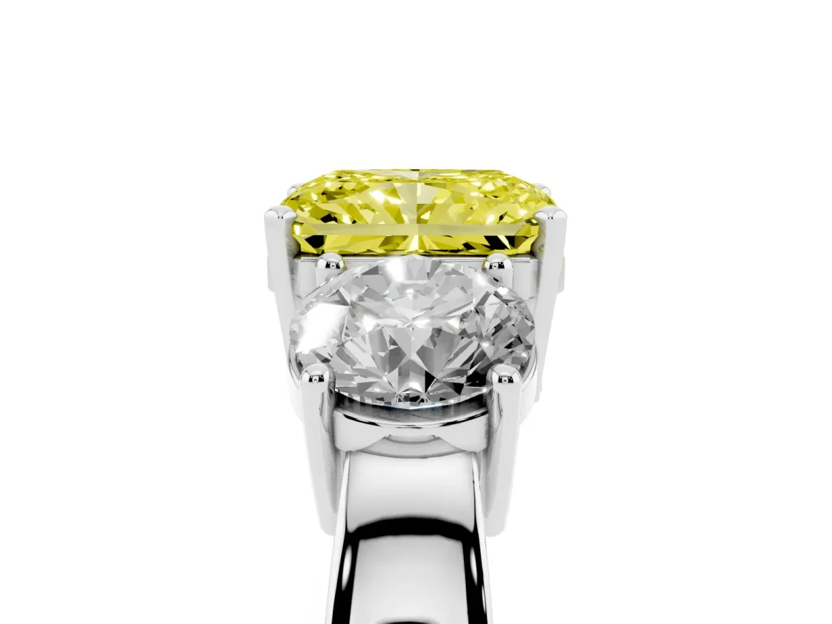 Fancy Yellow Three-Stone Radiant Cut Diamond Ring with Round Side Stones, Classic Band, and Four-Prong Setting Platinum